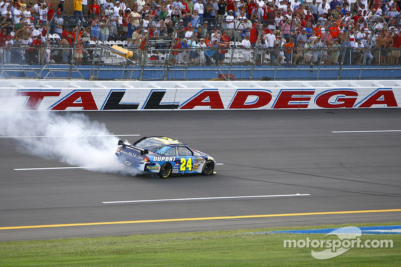 Race winner Jeff Gordon celebrates with a burnout