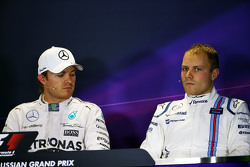 (L to R): Nico Rosberg, Mercedes AMG F1 and Valtteri Bottas, Williams in the post qualifying FIA Press Conference