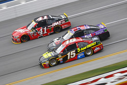 Clint Bower, Michael Waltrip Racing Toyota and Denny Hamlin, Joe Gibbs Racing Toyota and Kurt Busch, Stewart-Haas Racing Chevrolet