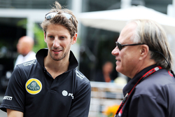 Ромен Грожан, Lotus F1 Team и Джин Хаас, президент Haas Automotion