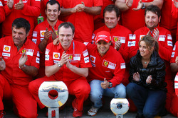 Scuderia Ferrari celebration shot: race winner Felipe Massa with Kimi Raikkonen and Scuderia Ferrari team members