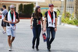 (L to R): Carlos Sainz Jr., Scuderia Toro Rosso with Tabatha Valles, Scuderia Toro Rosso Press Officer and Max Verstappen, Scuderia Toro Rosso