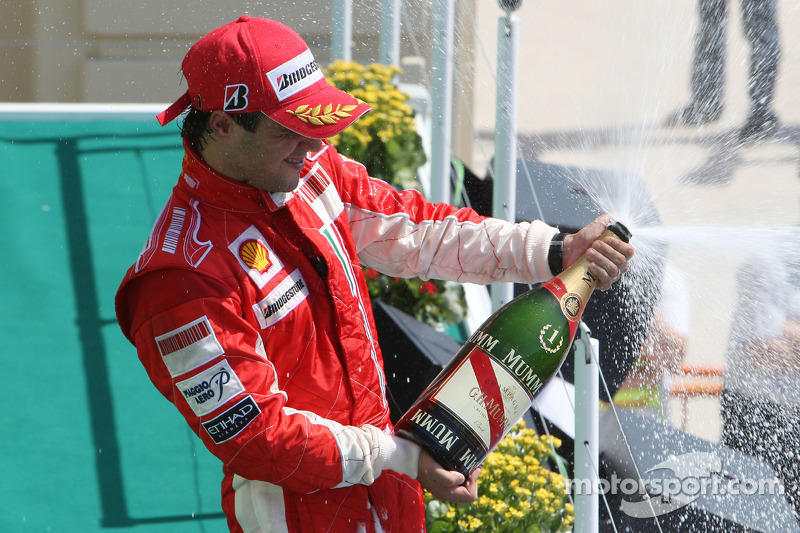 Podium: race winner Felipe Massa celebrates with champagne