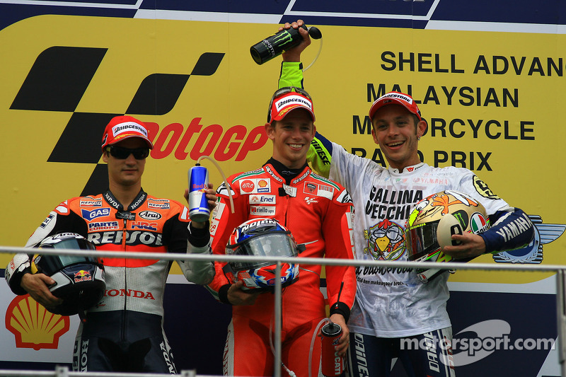 Podio: ganador de la carrera Casey Stoner, Ducati Marlboro Team, el segundo lugar Dani Pedrosa, Reps