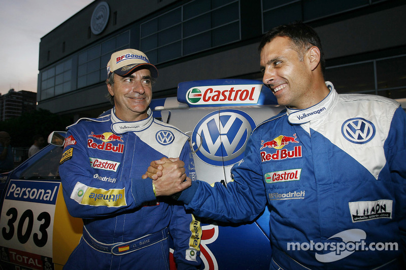 Cars podium: 2010 Dakar Rally winners in the cars category Carlos Sainz and Lucas Cruz Senra celebra