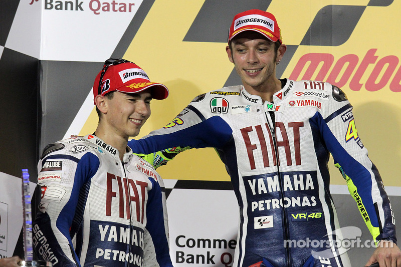 Podium: race winner Valentino Rossi, Fiat Yamaha Team with second place Jorge Lorenzo, Fiat Yamaha T